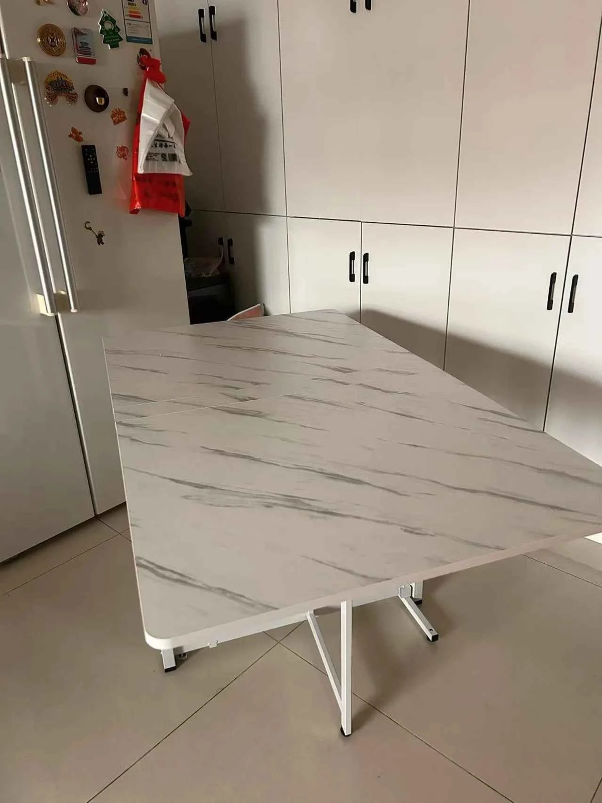 Space-Saving Folding with Wall-Mounted Drop-Leaf Table for Small spaces